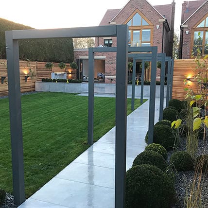 Garden with wooden walkways Garden with wooden and tiled walkway